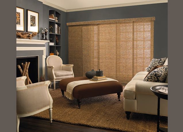 Destin Family room with navy walls and textured sliding panel tracks.